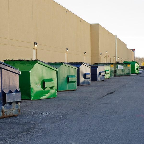 commercial waste container in a business parking lot